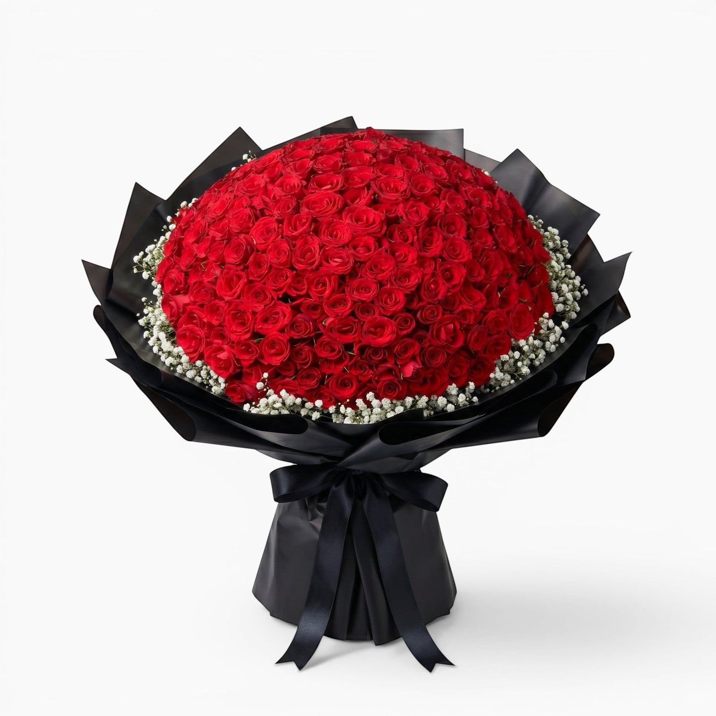The Flowercart opulent bouquet of 199 red roses with baby's breath wrapped in dramatic black paper and a silk ribbon.