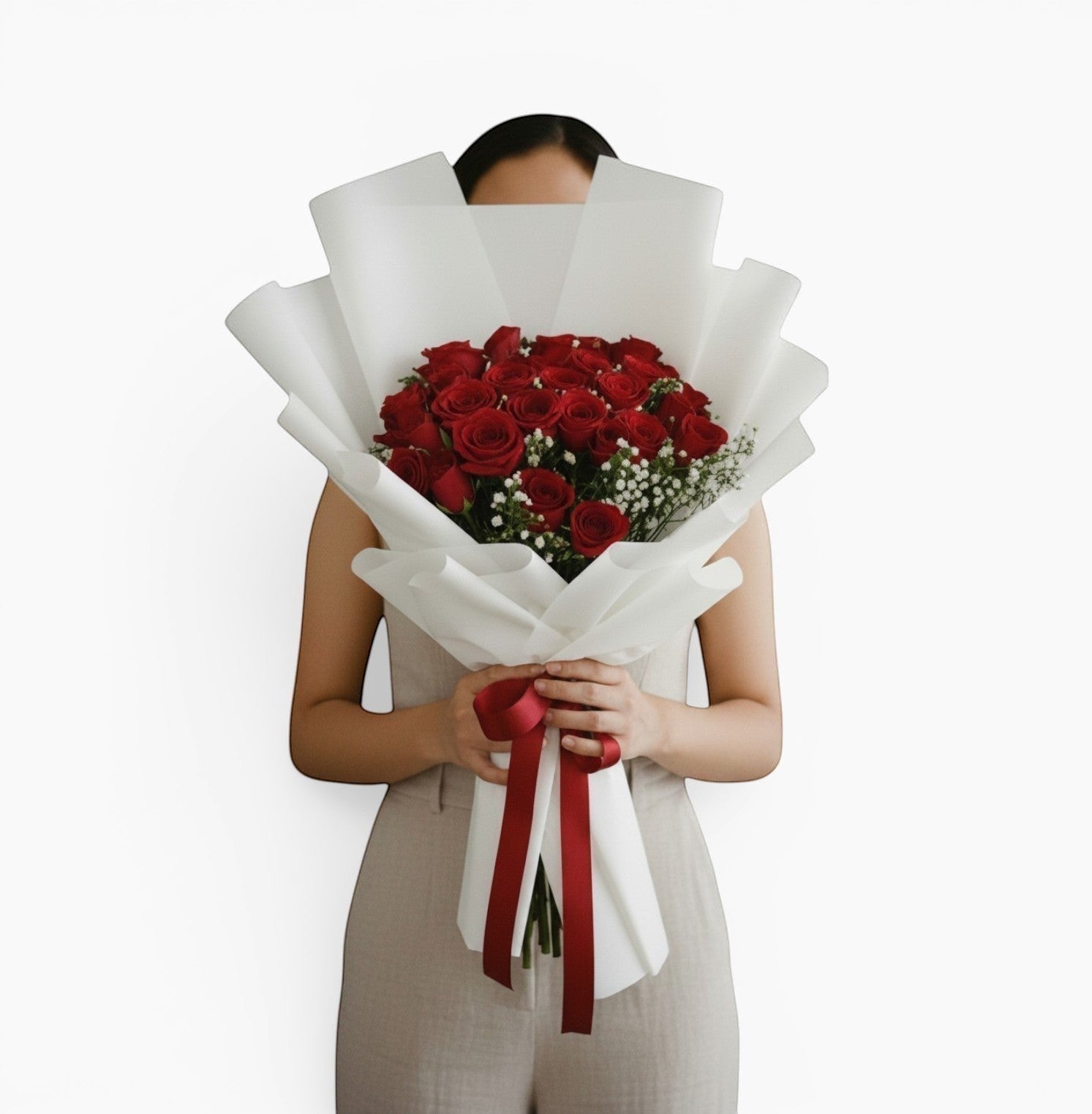 The Flowercart Forever Spring bouquet featuring 48 red roses and baby's breath wrapped in elegant white paper.