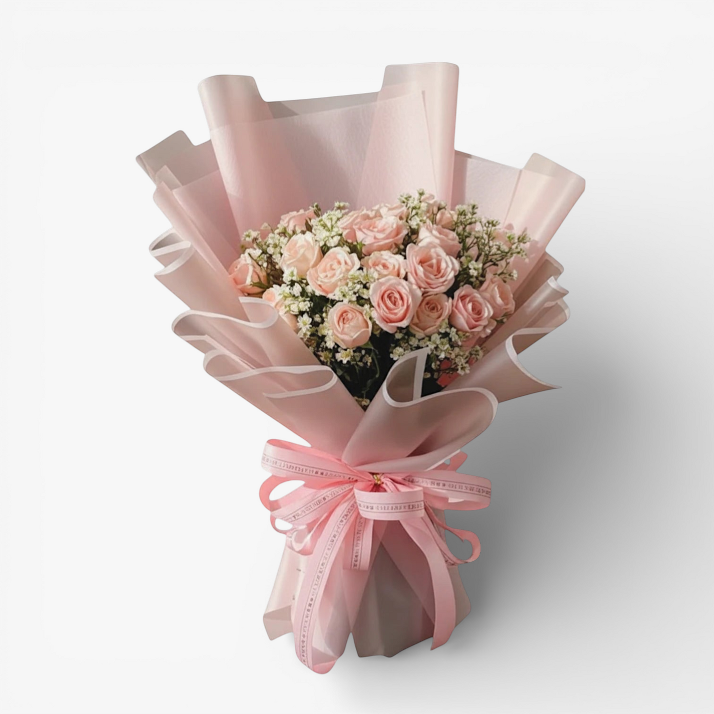 The Flowercart's California Dreaming bouquet: 24 soft pink roses with baby's breath, wrapped in pink paper and tied with a pink ribbon.