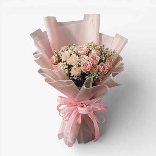 The Flowercart's California Dreaming bouquet: 24 soft pink roses with baby's breath, wrapped in pink paper and tied with a pink ribbon.