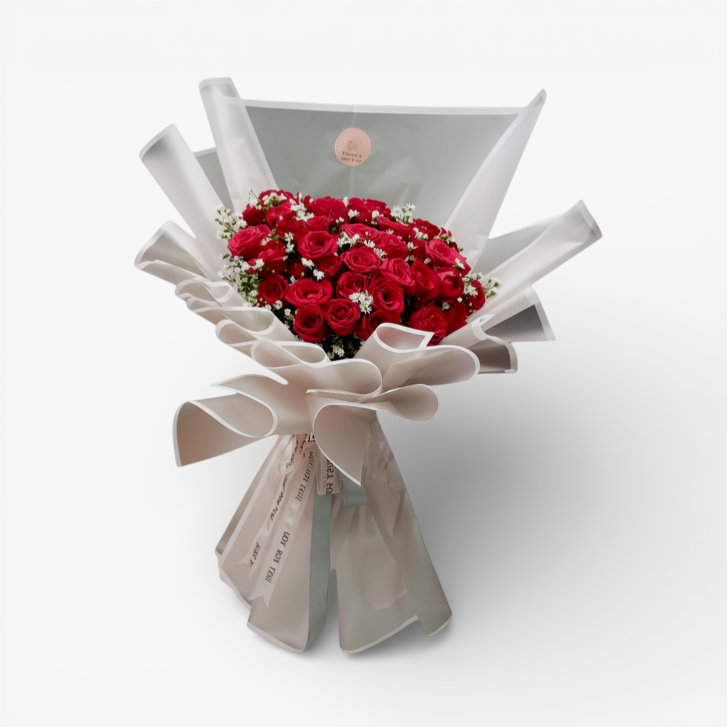 The Flowercart's Scarlet bouquet: 50 red roses with baby's breath, elegantly wrapped. Perfect for romance.